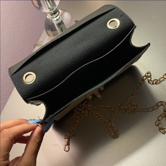 A small purse. Mostly for accessory. Black with some crème. - Picture 4 of 5